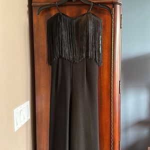 Black strapless Jessica Simpson jumpsuit with fringe